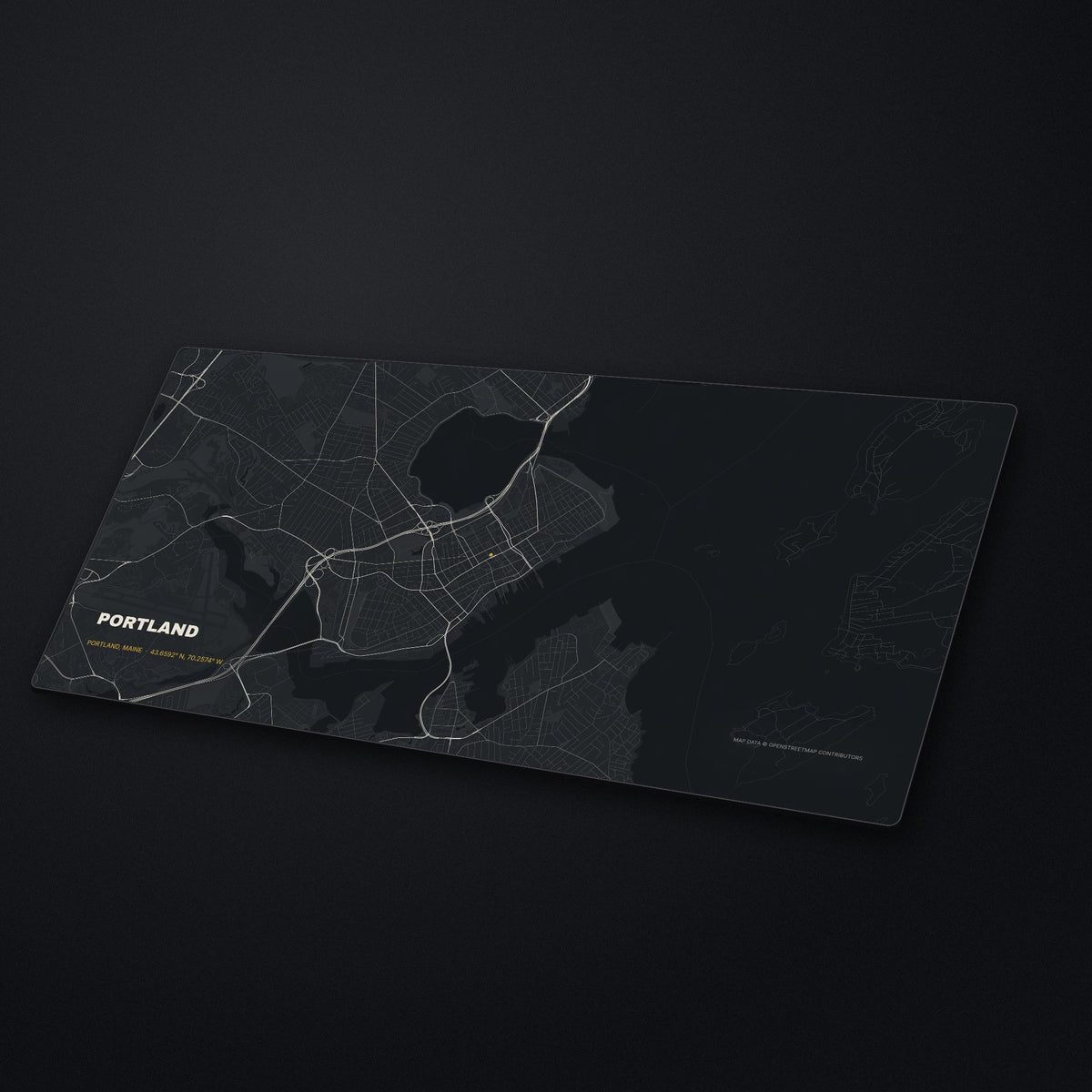 Portland Street Map Desk Mat at an angle on a stone desk