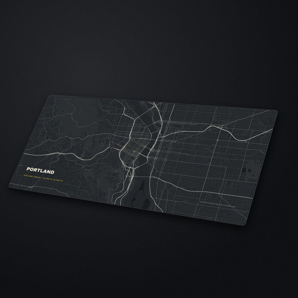 Portland Street Map Desk Mat at an angle on a stone desk