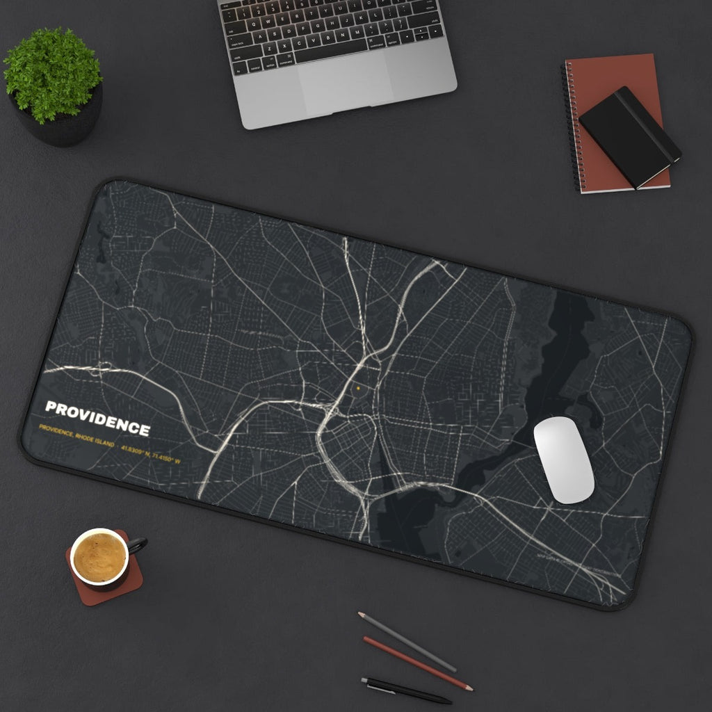 Providence Street Map desk mat on a desk with a laptop, mouse and coffee cup for scale