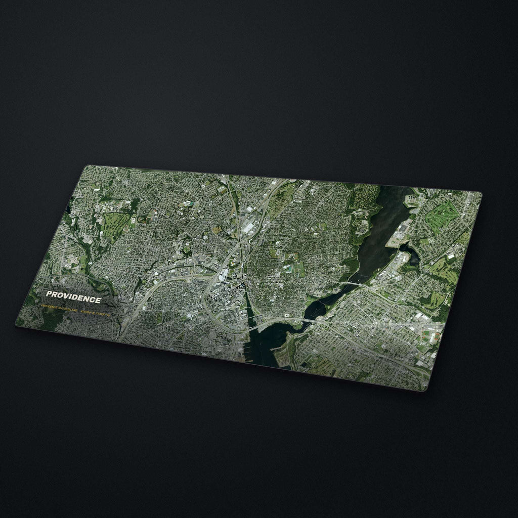 Providence Satellite Desk Mat at an angle on a stone desk