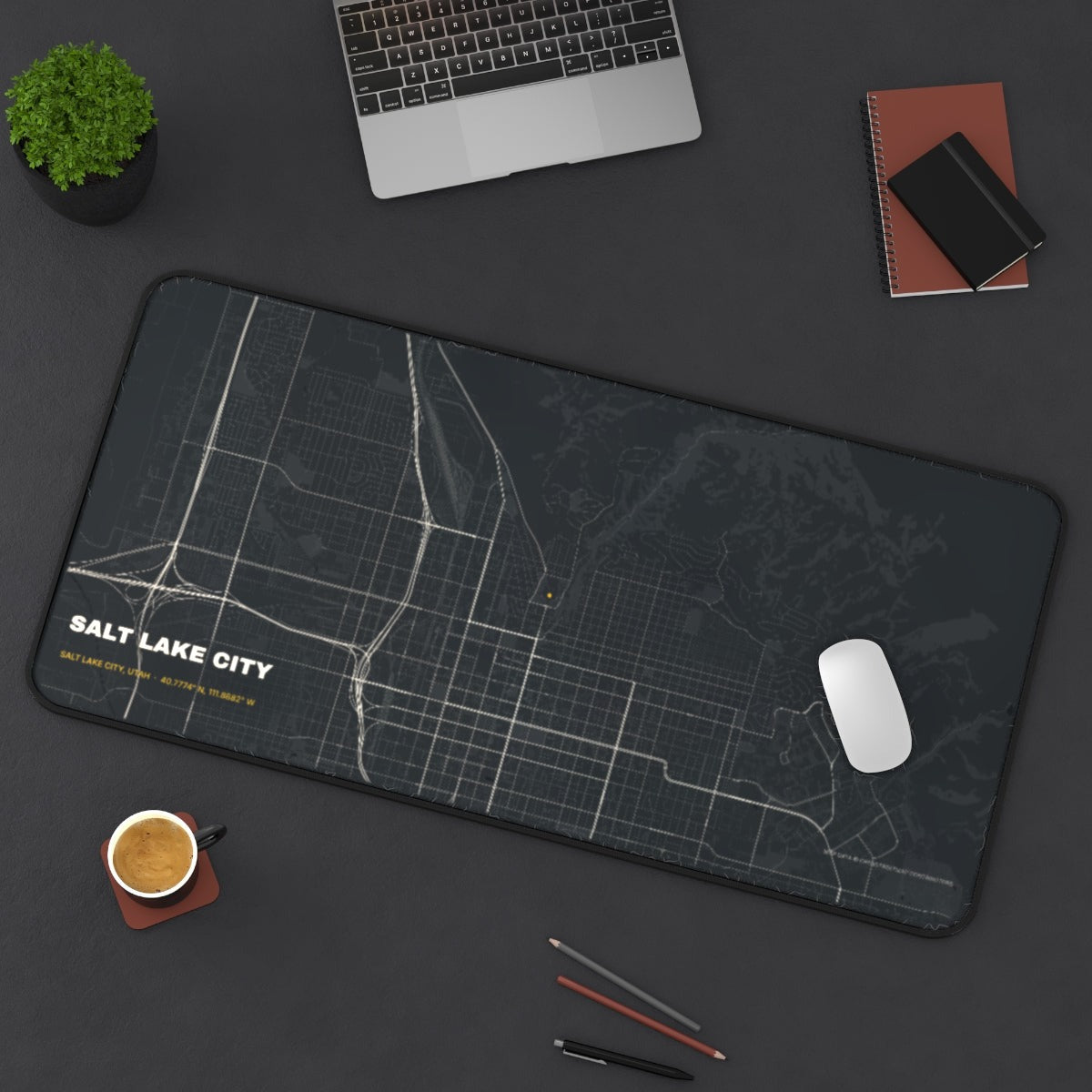 Salt Lake City Street Map desk mat on a desk with a laptop, mouse and coffee cup for scale