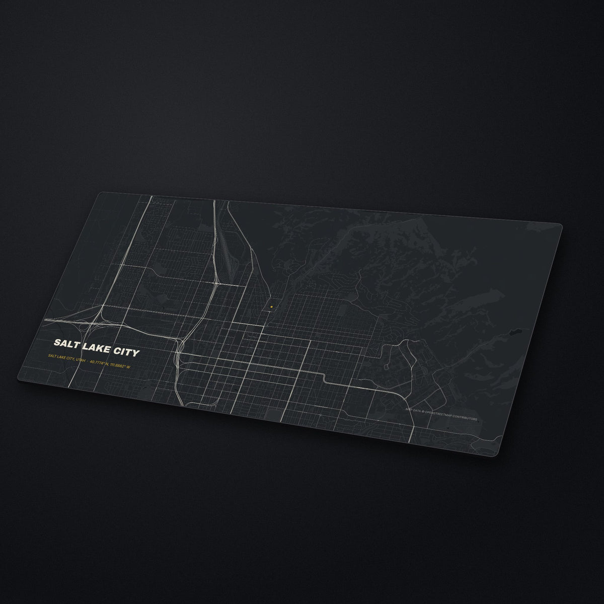 Salt Lake City Street Map Desk Mat at an angle on a stone desk