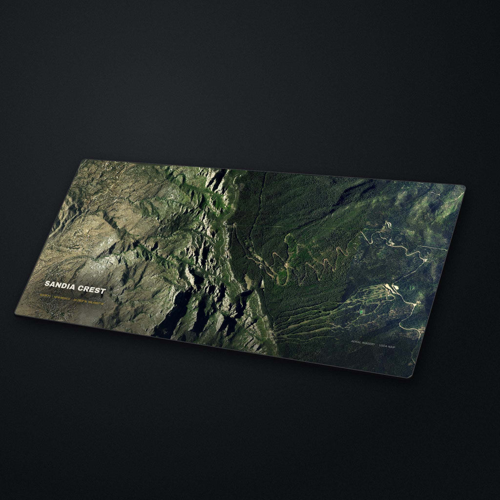 Sandia Crest Satellite Desk Mat at an angle on a stone desk