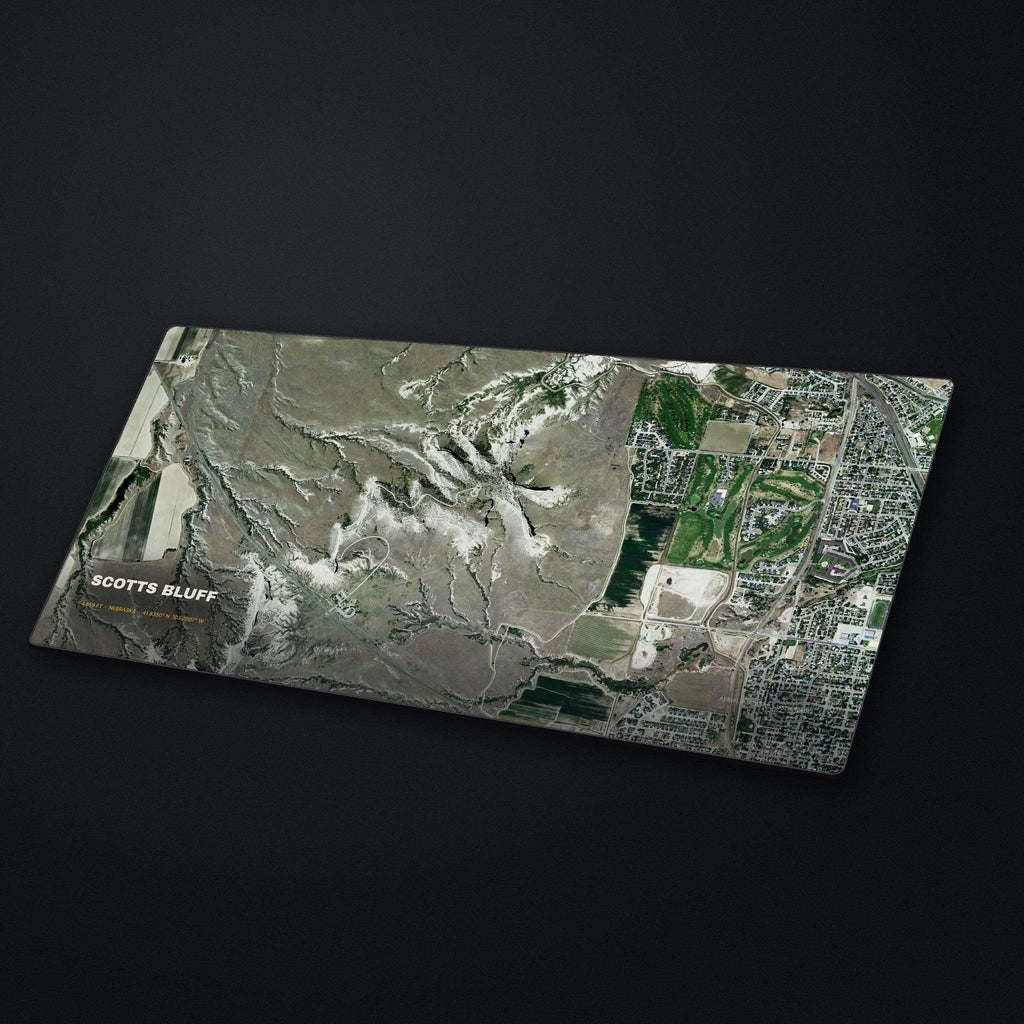 Scotts Bluff Satellite Desk Mat at an angle on a stone desk