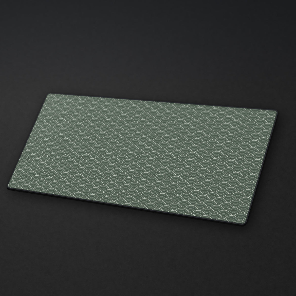 Seigaiha Desk Mat at an angle on a stone desk