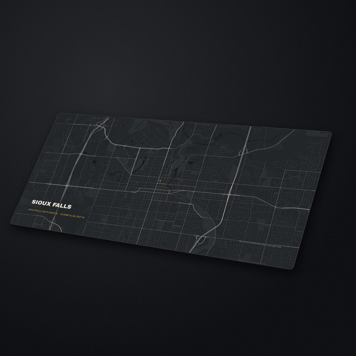 Sioux Falls Street Map Desk Mat at an angle on a stone desk