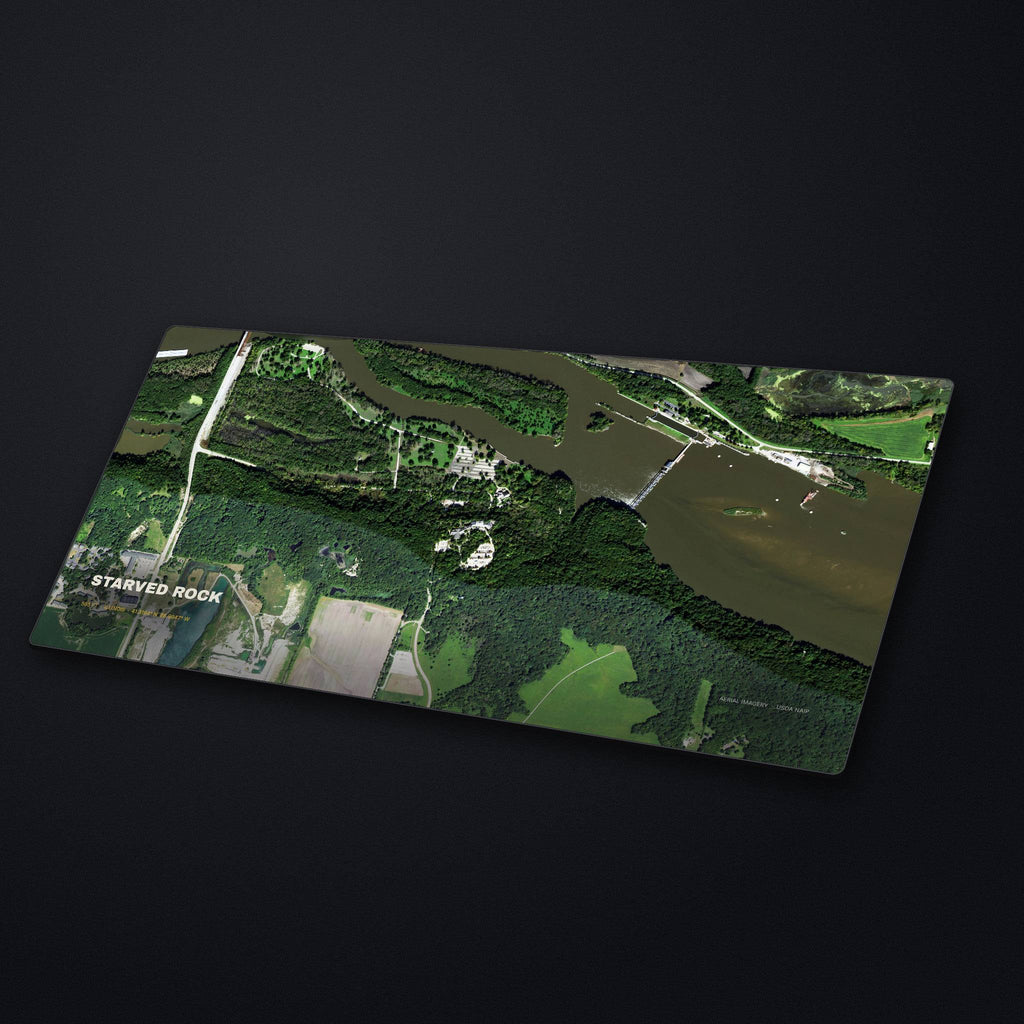 Starved Rock Satellite Desk Mat at an angle on a stone desk
