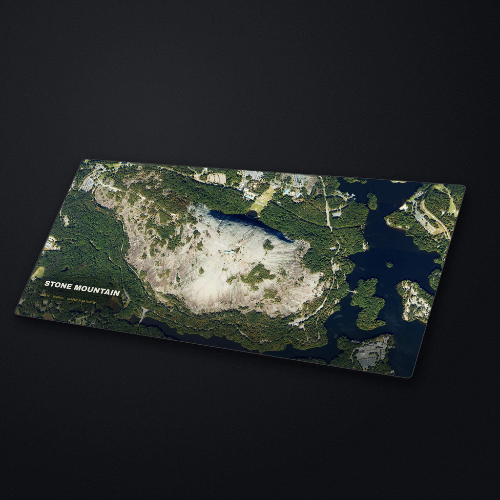 Stone Mountain Satellite Desk Mat at an angle on a stone desk