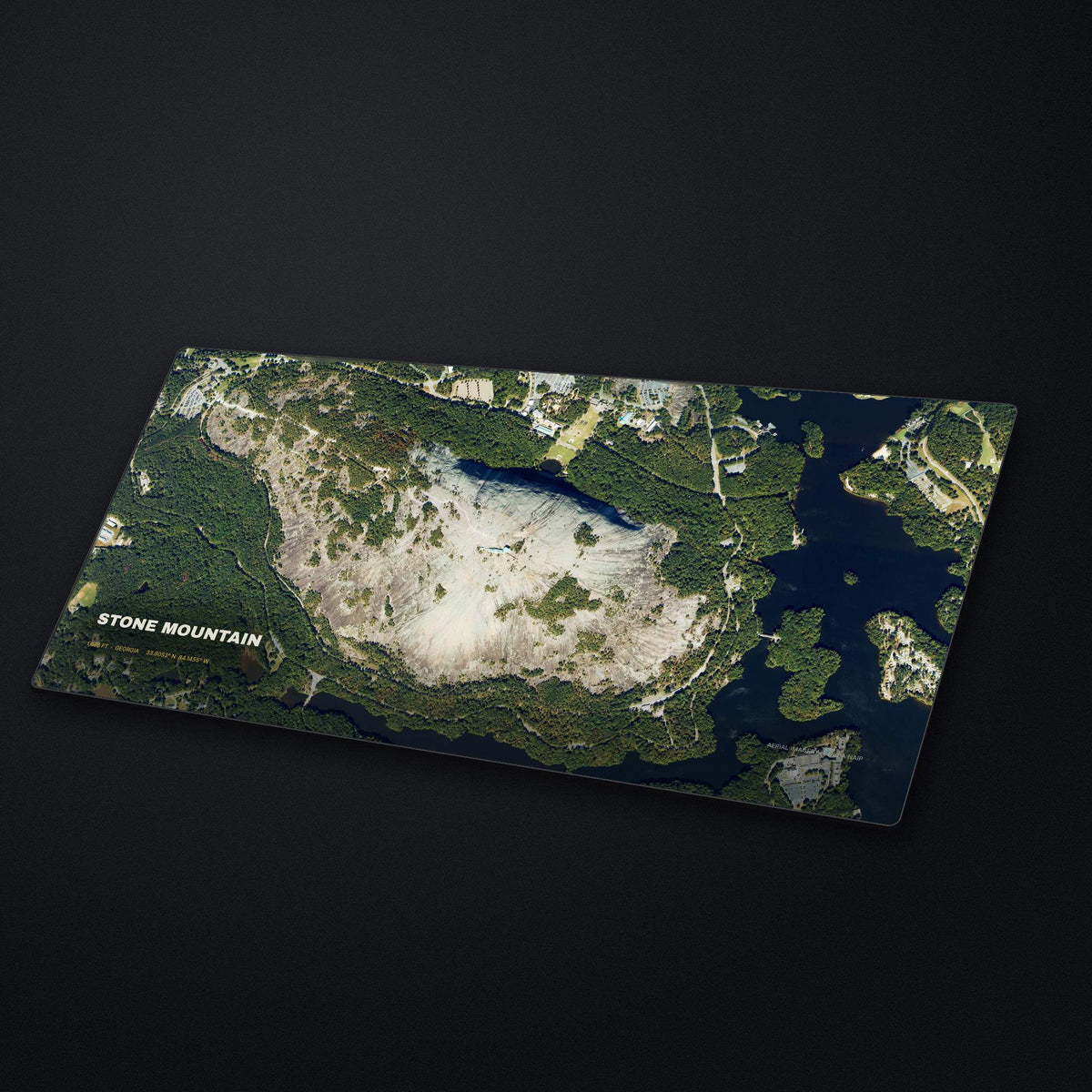 Stone Mountain Satellite Desk Mat at an angle on a stone desk