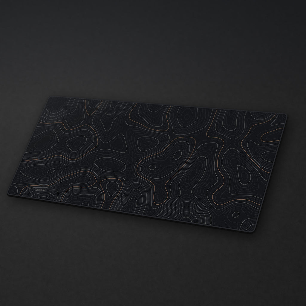Topo Desk Mat at an angle on a stone desk