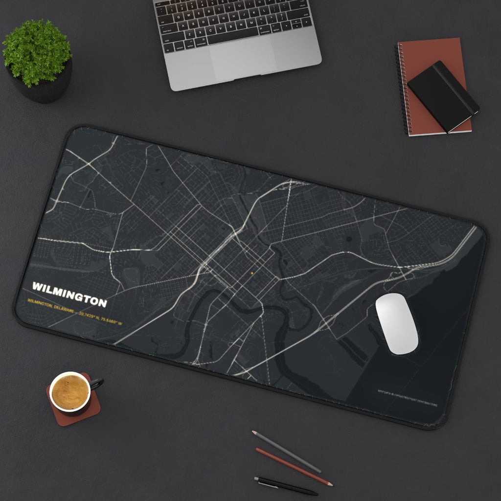 Wilmington Street Map desk mat on a desk with a laptop, mouse and coffee cup for scale