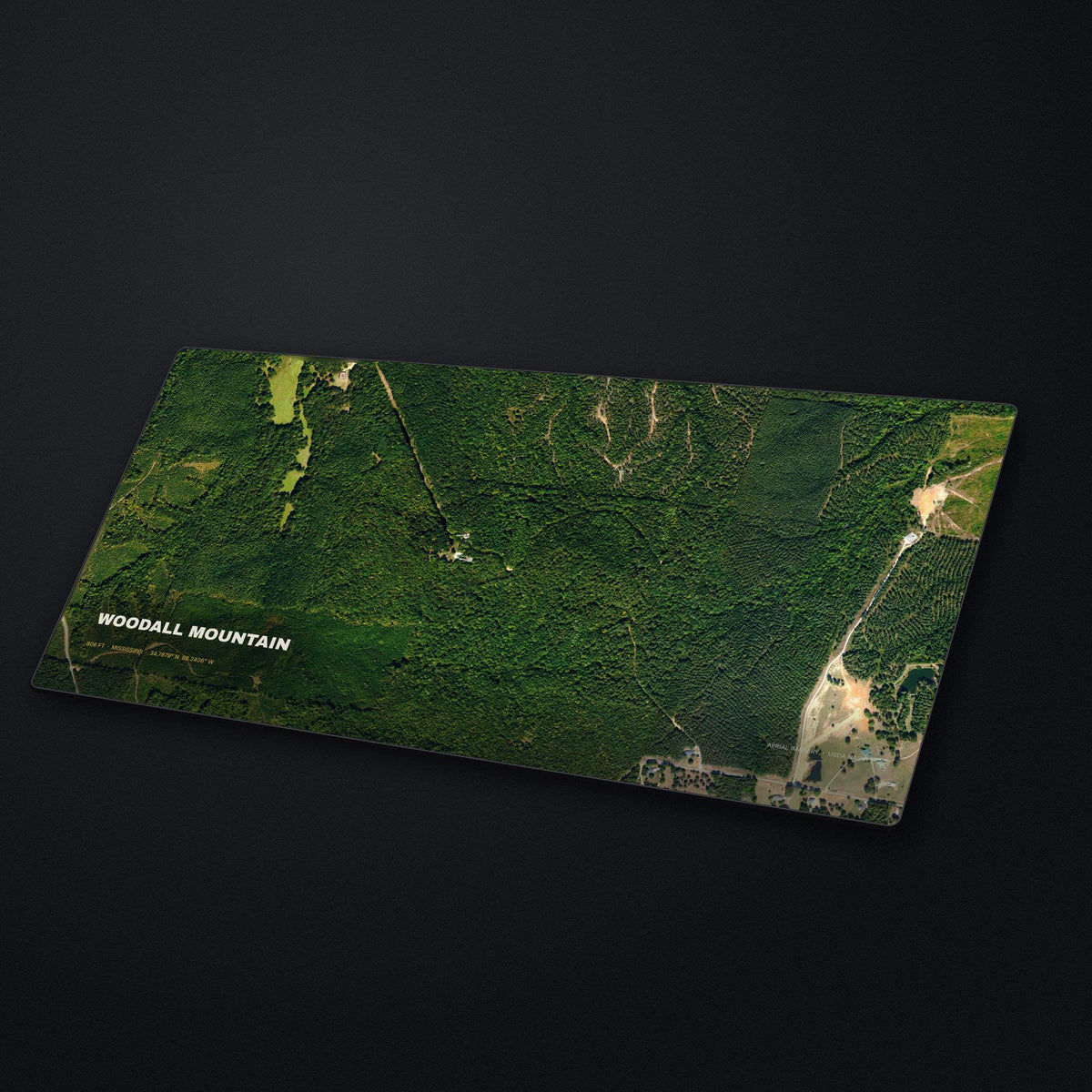 Woodall Mountain Satellite Desk Mat at an angle on a stone desk