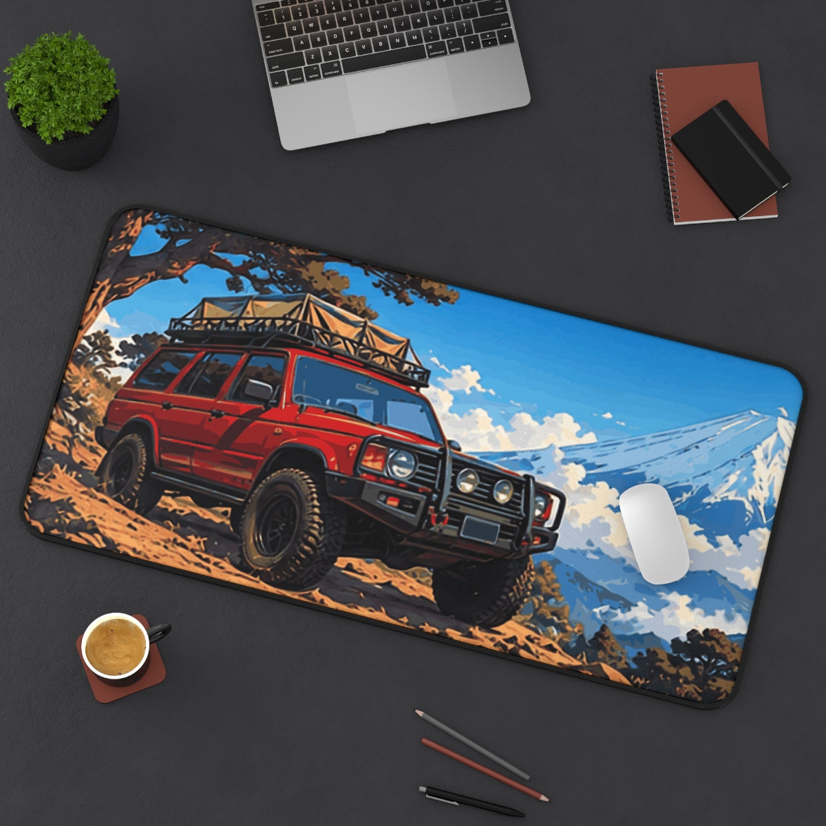 Summit Expedition desk mat on a desk with a laptop, mouse and coffee cup for scale